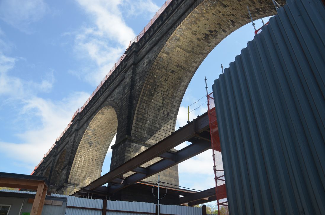 Stone arches of the High Bridge as seen from outside the office trailers on the Bronx side<br/>
